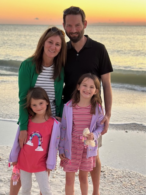 Deanna and family on the beach